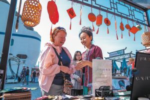 Overseas visitors leave with bounty of bargains, memories